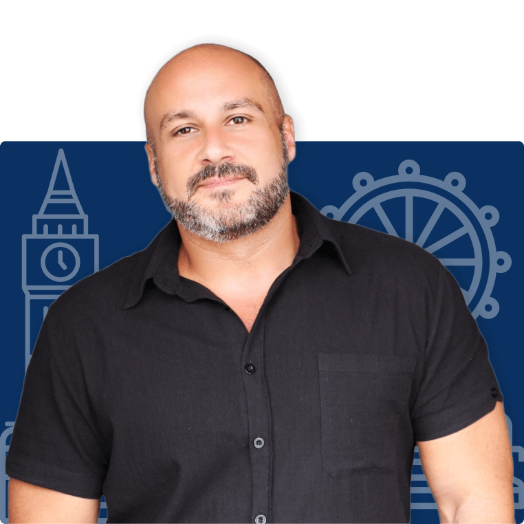 Man in black shirt with blue background.